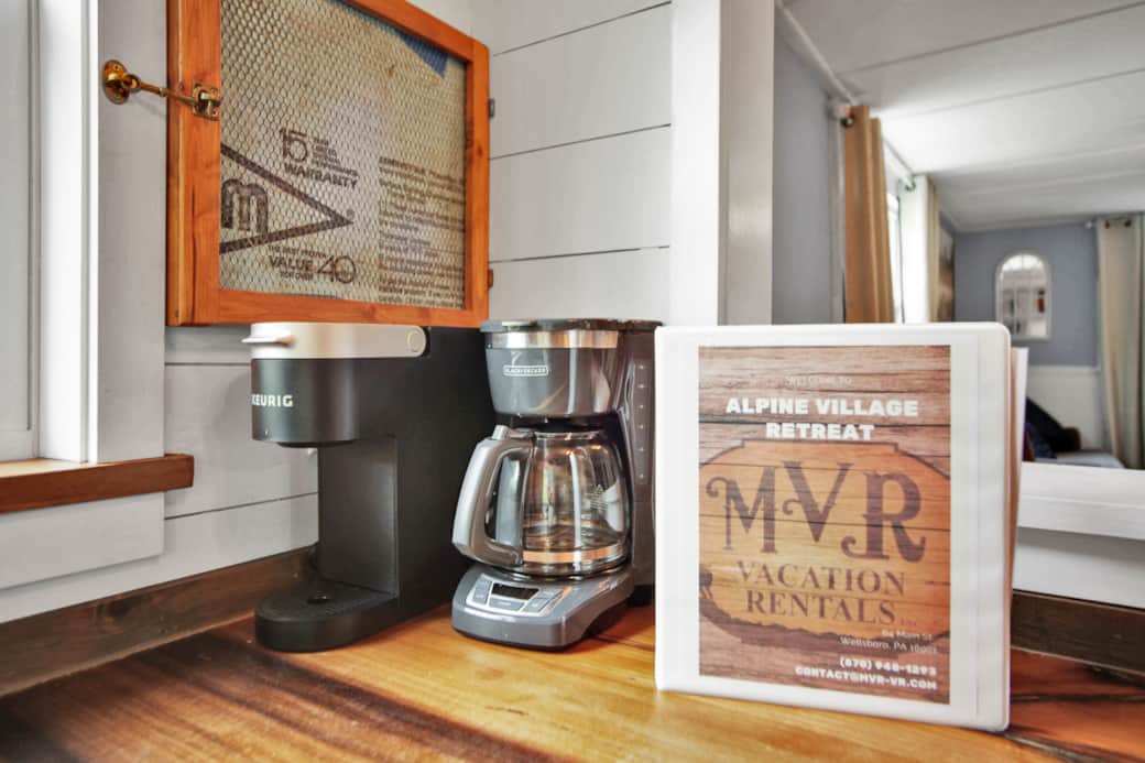 Kitchen with Keurig and coffee pot, outdoor bbq, crockpot. 