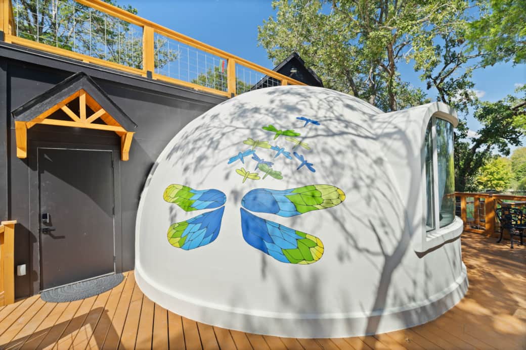 Take a photo in front of the fairy mural