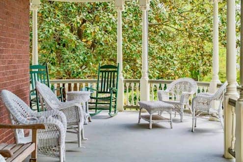 Mansion wrap around porch at The Carriage House Inn & Events, Lynchburg, VA