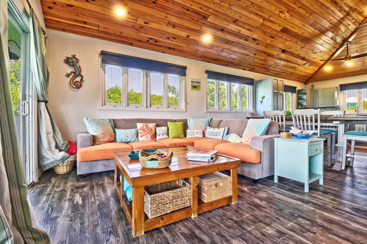 Our open floorplan living area flows from living room, to dinging coffee/wet bar to kitchen
