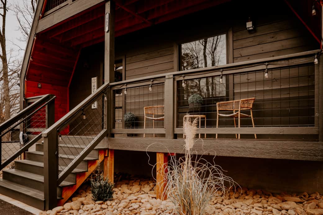 Covered front porch with seating for two and smart-lock entry Covered front porch with seating for two and smart-lock entry