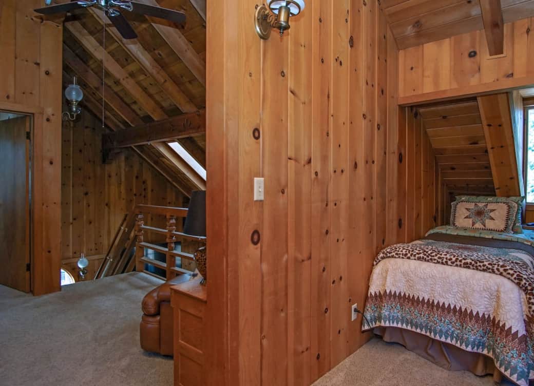 This cozy, Twin Star open-concept sleeping nook is located right off the main stairwell. After a long day of exploring, retreat to these twin Tempur-Pedic beds featuring custom head/foot adjustability and relaxing massage features