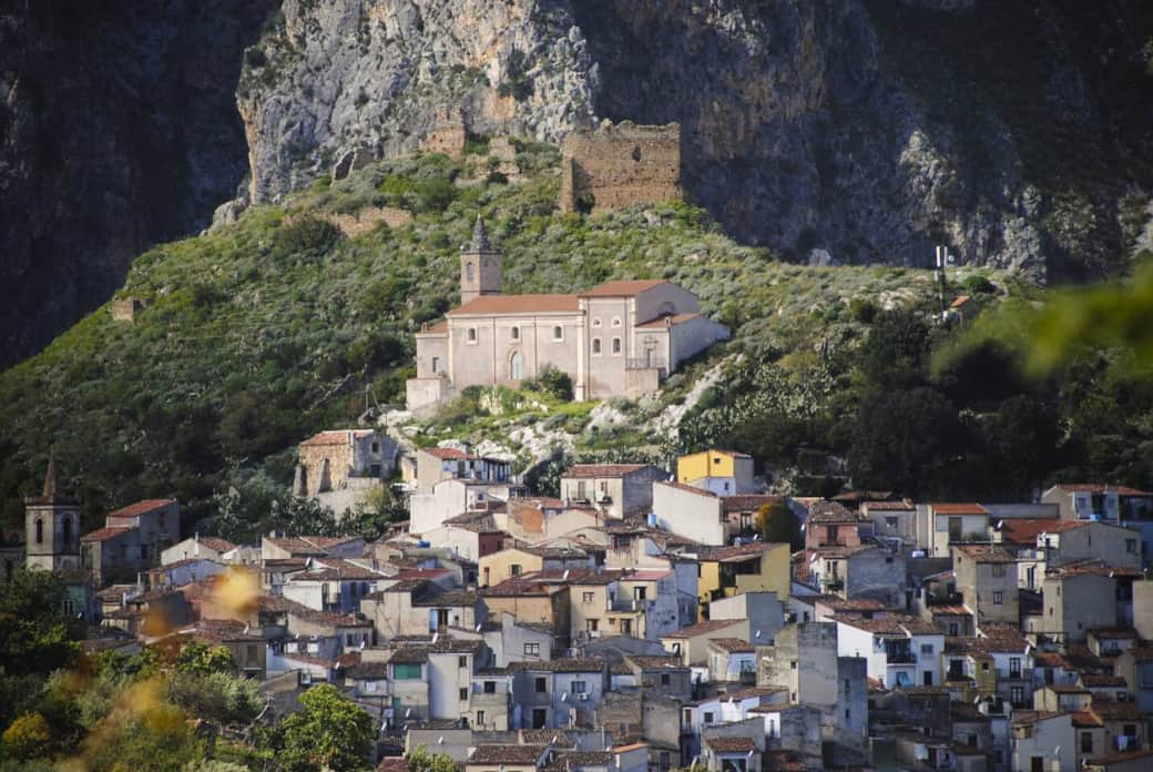 Isnello village with Santa Maria Church and Castle Ruins