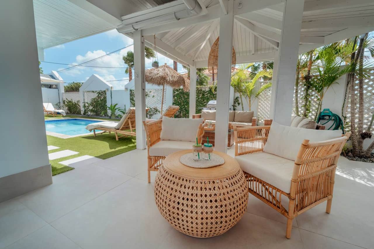 Covered lounge area for shaded relaxation and sunset drinks
