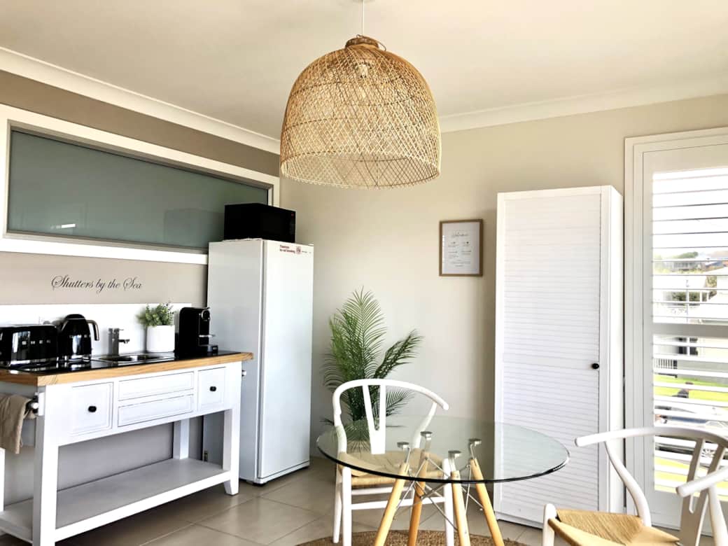Kitchenette and dining area at Shutters by the Sea