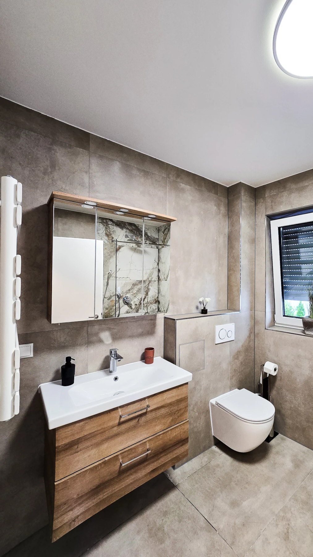 frensdorf-apartments-a2-badezimmer-waschbecken.png