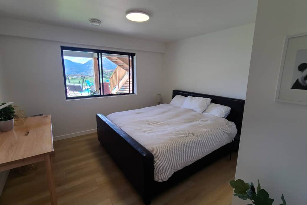 This bedroom is a part of the suite. The bed is a king size.