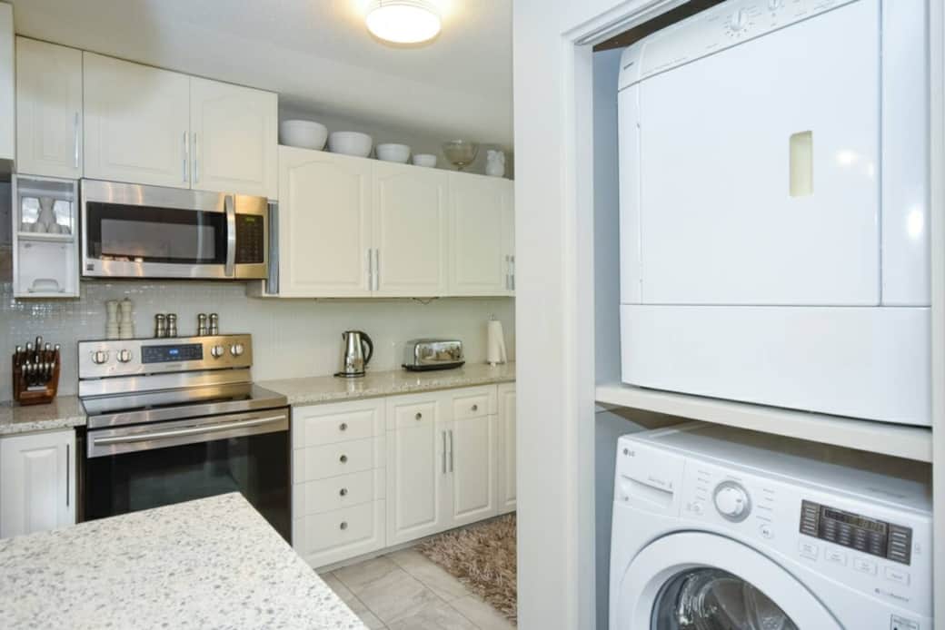 Ultimate convenience with this modern, fully equipped kitchen paired with in-suite laundry