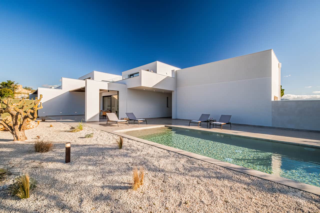 A stunning villa with sleek modern lines, where elegance and comfort blend effortlessly. 