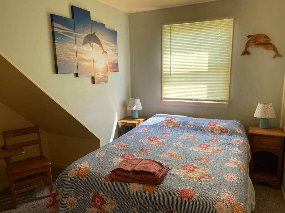 The Dolphin room is on the 1st floor, has 1 queen, a TV, board game library and blackout curtains.