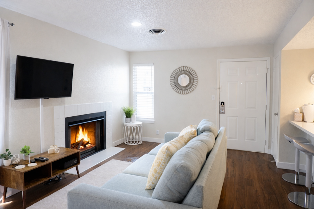 Snuggle up by the real fireplace! Just bring your own firewood and you’re all set. Snuggle up by the real fireplace! Just bring your own firewood and you’re all set.