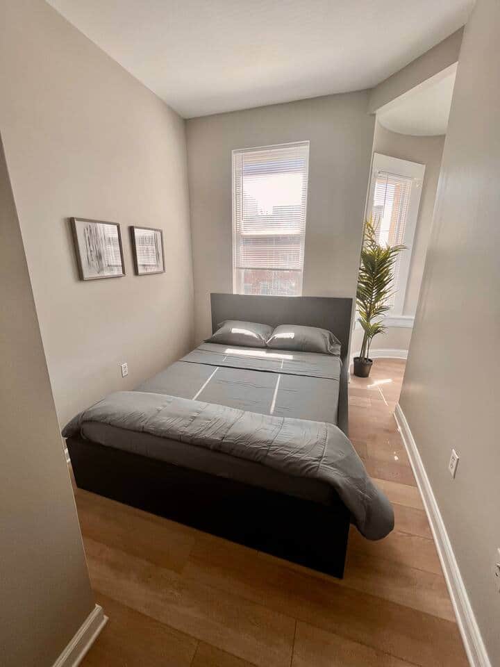 Bedroom 1 with queen bed plenty of widows and closet.