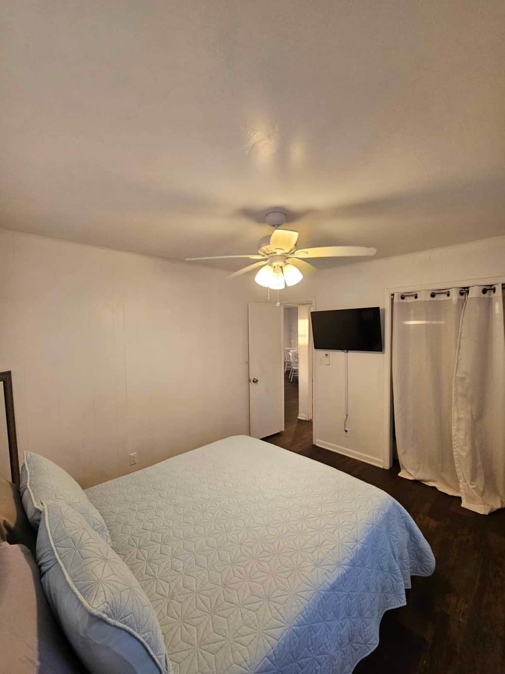 Bedroom has a wall mounted TV for a cozy night in Bedroom has a wall mounted TV for a cozy night in