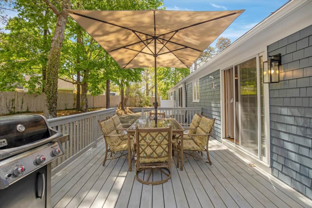 Deck with dining, gas grill & shade umbrella