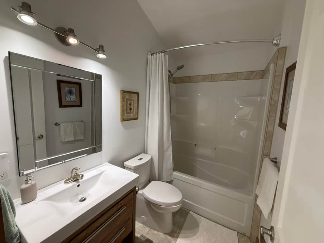 Full bathroom with soaker tub Full bathroom with soaker tub