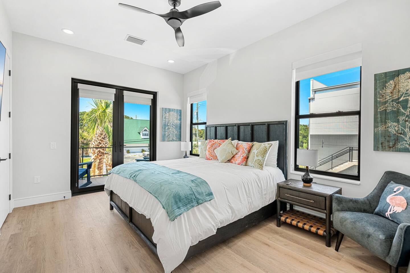 Wake up to fresh air and palm tree views from your private balcony, in bedroom 6.