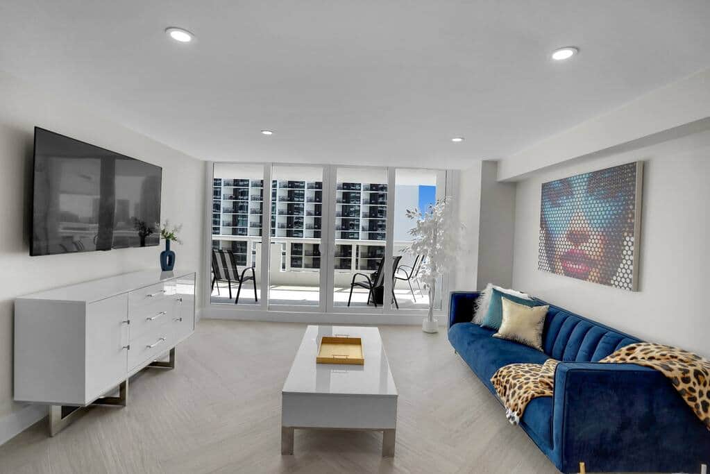 Living area with Roku streaming tv, balcony access