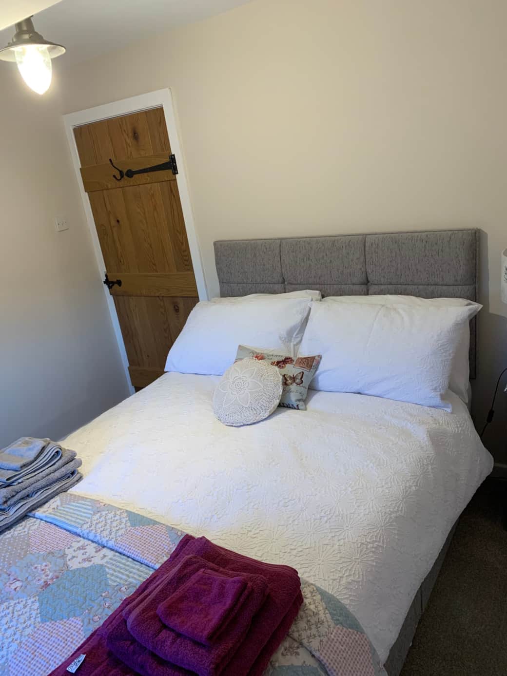 2nd bedroom with standard double bed and walk -in cupboard.