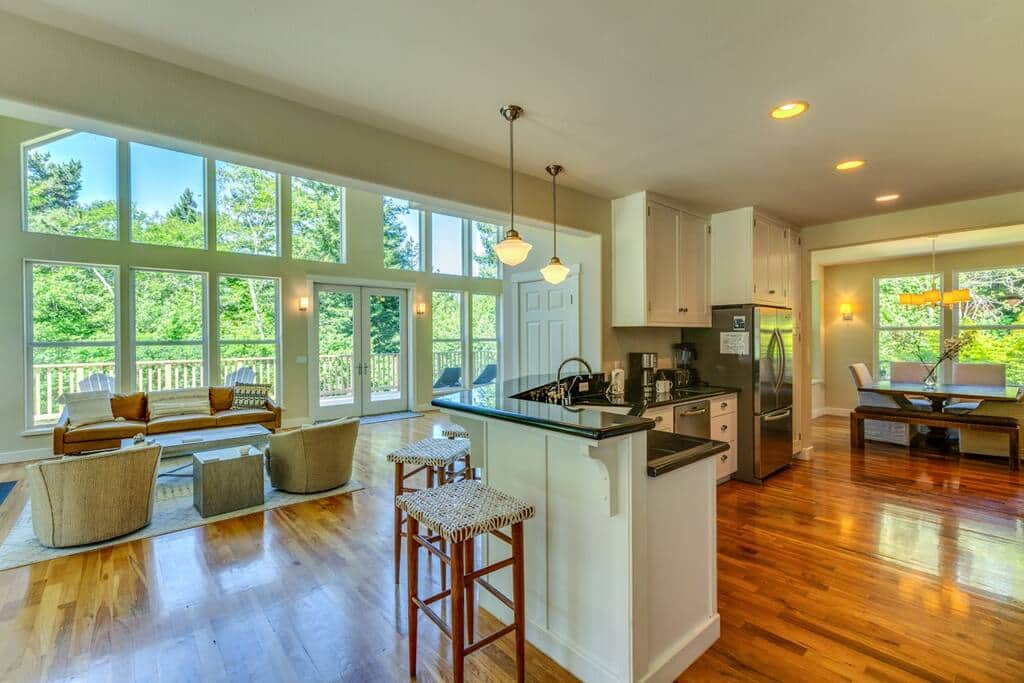 Our home has high ceilings, a gourmet kitchen with 8 burner range, and beautiful views.