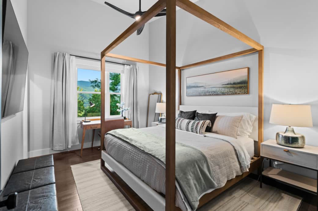 Upper primary bedroom with luxury bed and en-suite bathroom. Upper primary bedroom with luxury bed and en-suite bathroom.