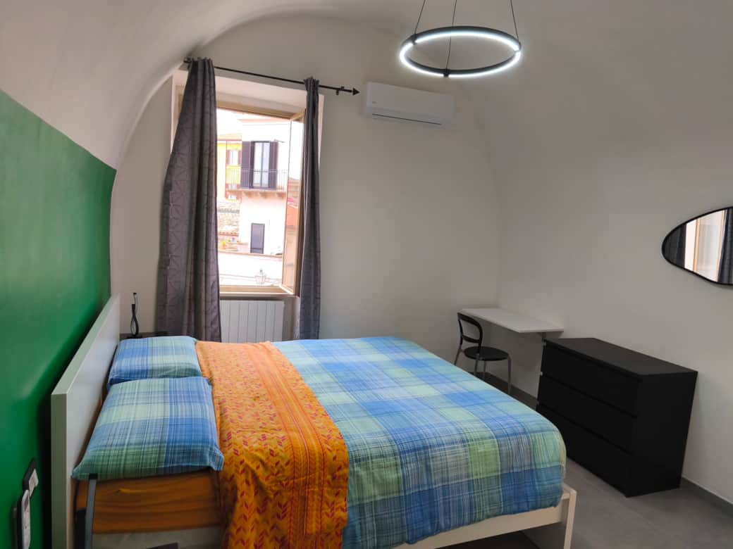 Camera da letto principale con aria condizionata presso Agli Archi Eco House a Chieti