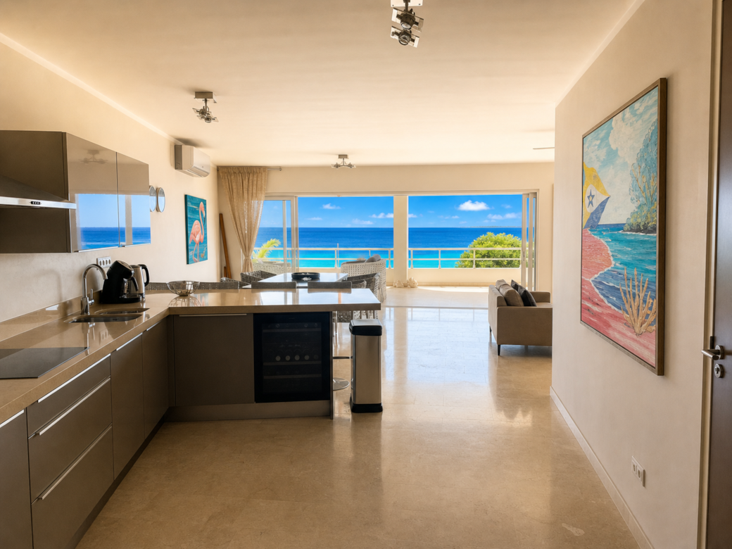 keuken en woonkamer Seaside Suite 3 met tropisch uitzicht
