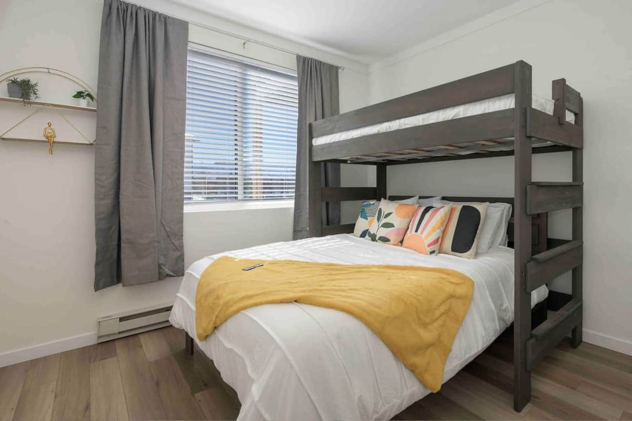 Chill out in the 2nd bedroom. Stocked with fun activities & a smart TV. Top bunk is furnished with a new Brooklyn bedding twin XL mattress. The bottom bed is a Queen with a premium Helix mattress!  Control your own heat with separate thermostat. 