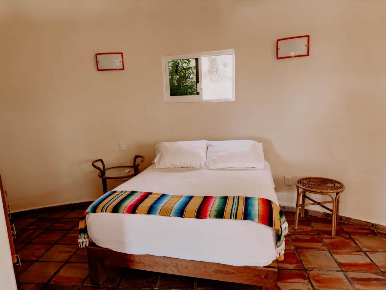 Bedroom with queen sized beds and ceiling fan.