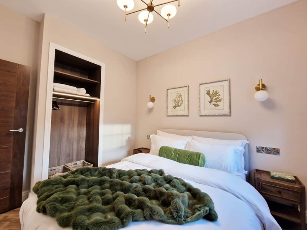 Second king size bedroom with wardrobe and TV