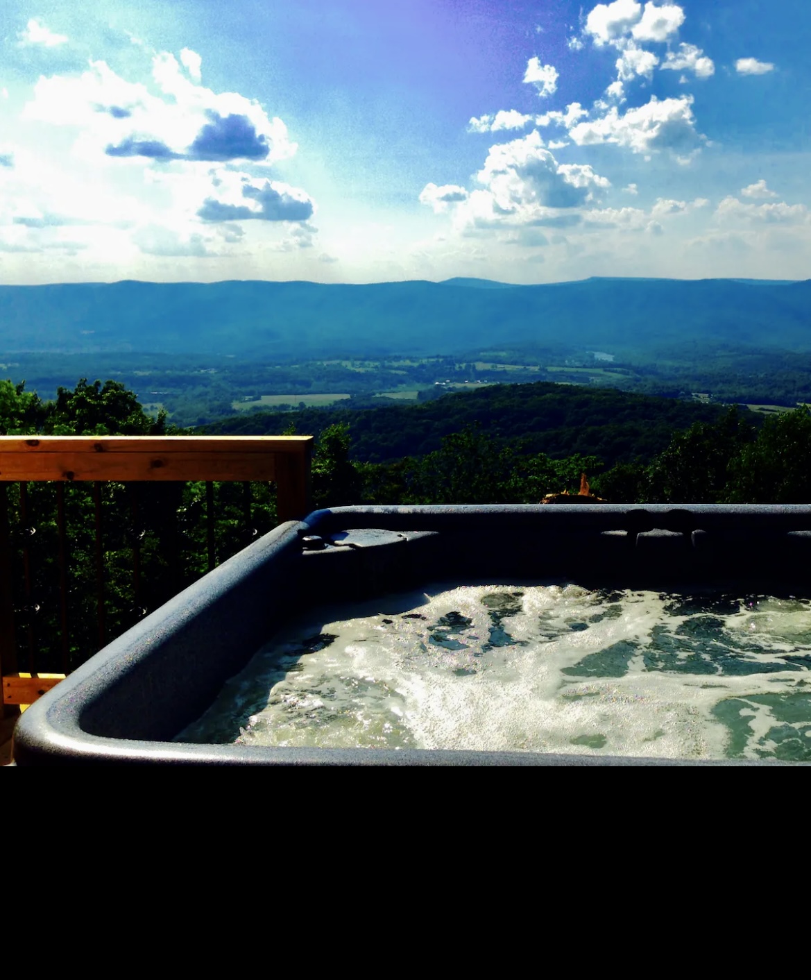 Enjoy a hot tub soak with breathtaking mountain views