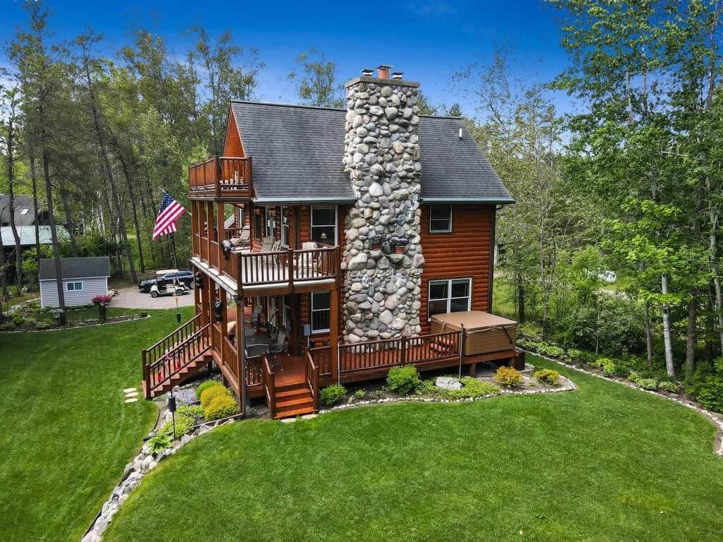 Side of house with hot tub