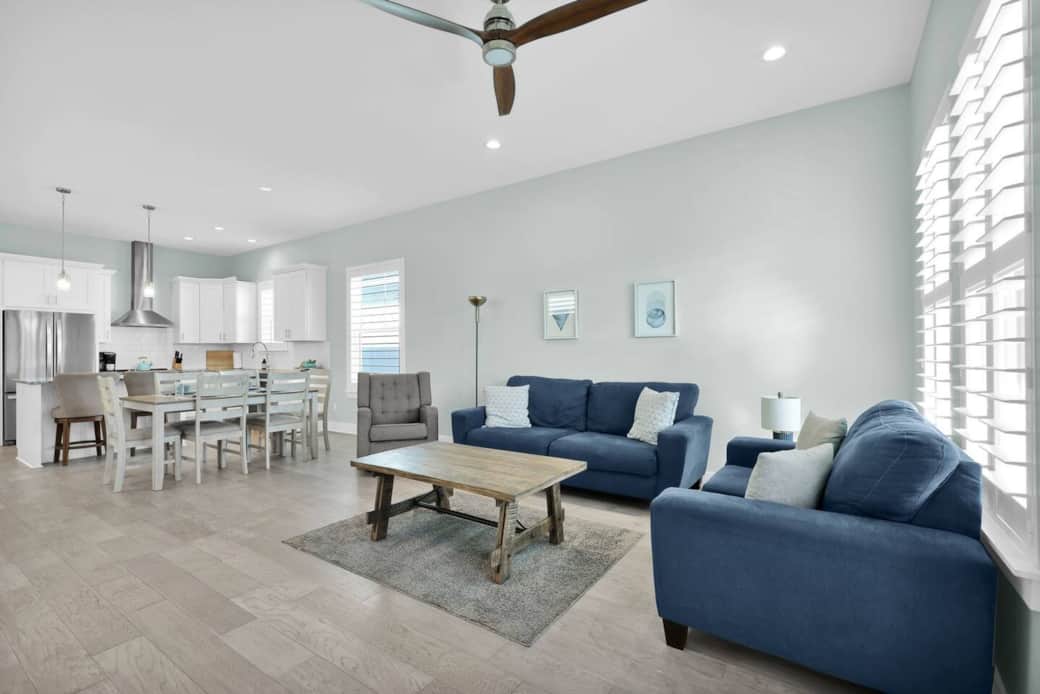 Living room easily flows into dining area. 