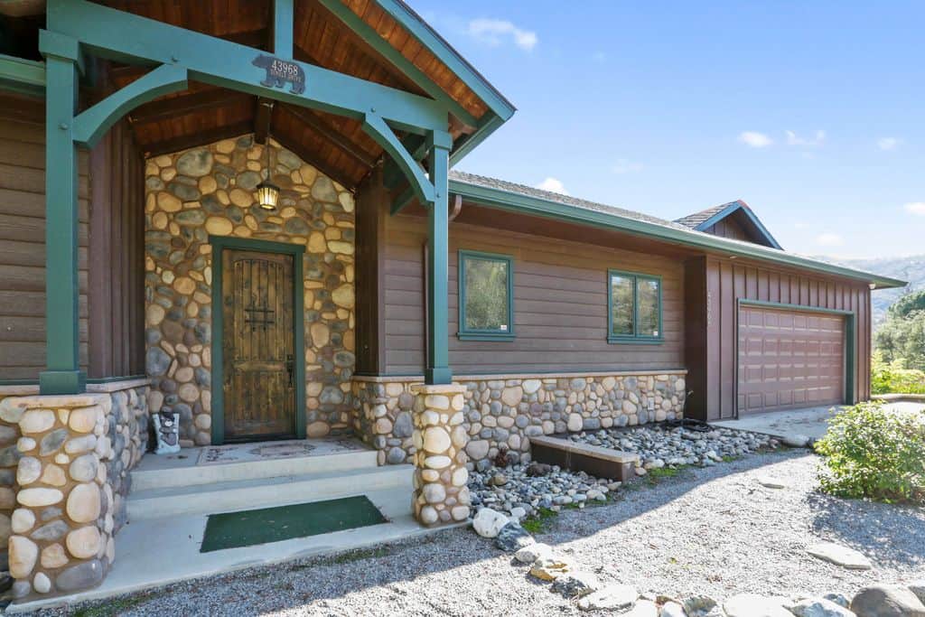 Front Entrance and two car enclosed Garage viable from Dinely Drive.