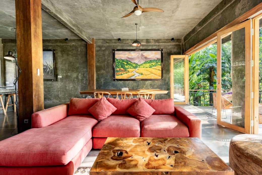 Bright lounge with artisan wooden furniture and vibrant accents