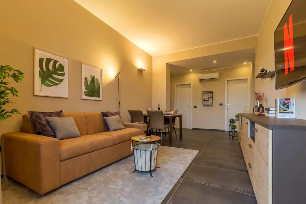 Bright and spacious living area with dining table for six people, 55" Smart TV (Netflix, Amazon prime, Disney+ and many other entertainment app available) and air conditioning Bright and spacious living area with dining table for six people, 55" Smart TV (Netflix, Amazon prime, Disney+ and many other entertainment app available) and air conditioning