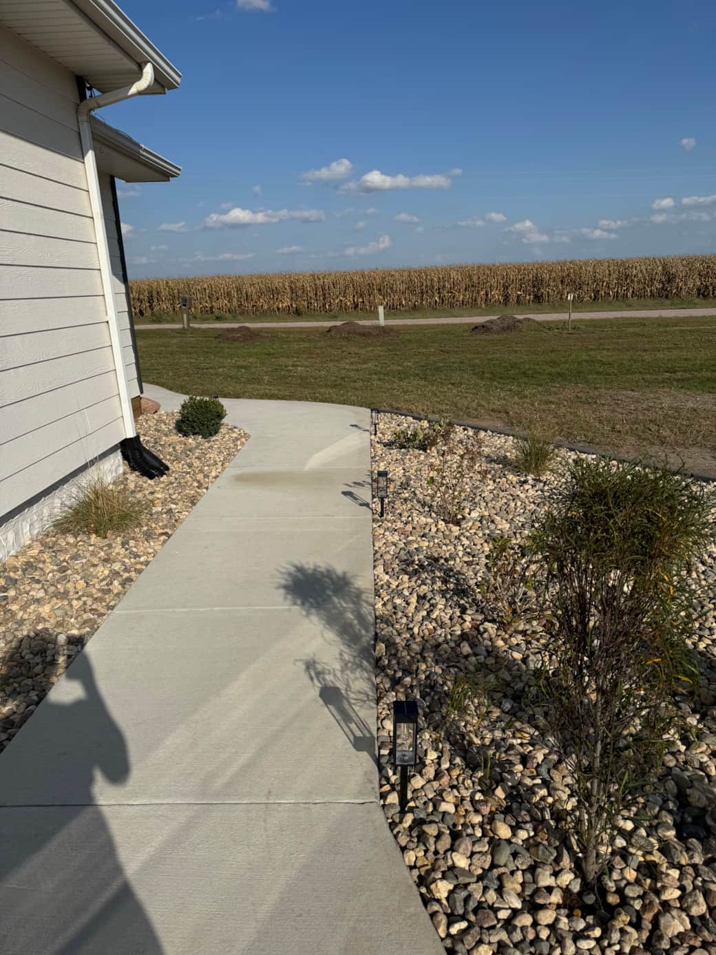 Wrap around sidewalk to the large patio. Wrap around sidewalk to the large patio.