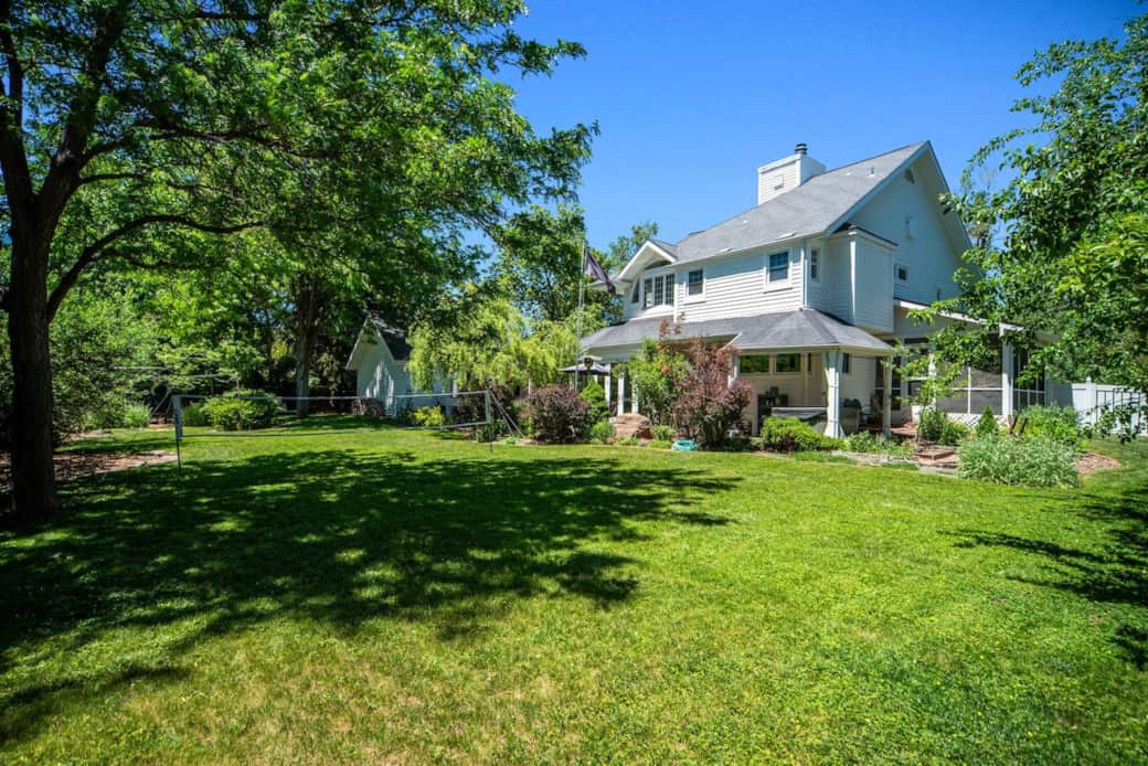 Mature trees, badminton, hot tub & seating galore. Plenty of room for the pup as well!