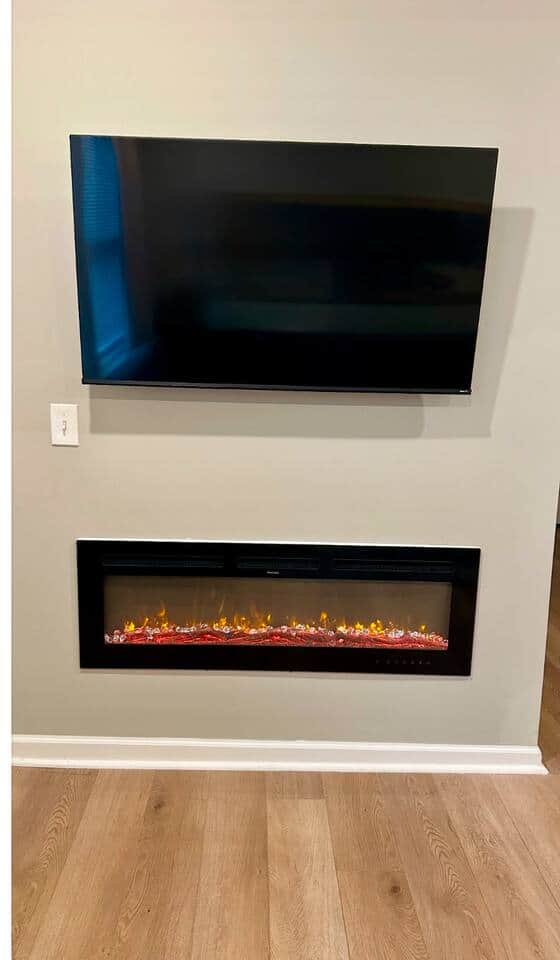 You'll find a comfortable living room equipped with a flat-screen TV for your entertainment needs. We've also recently added an electric fireplace to enhance the ambiance, providing a warm and inviting atmosphere for relaxation