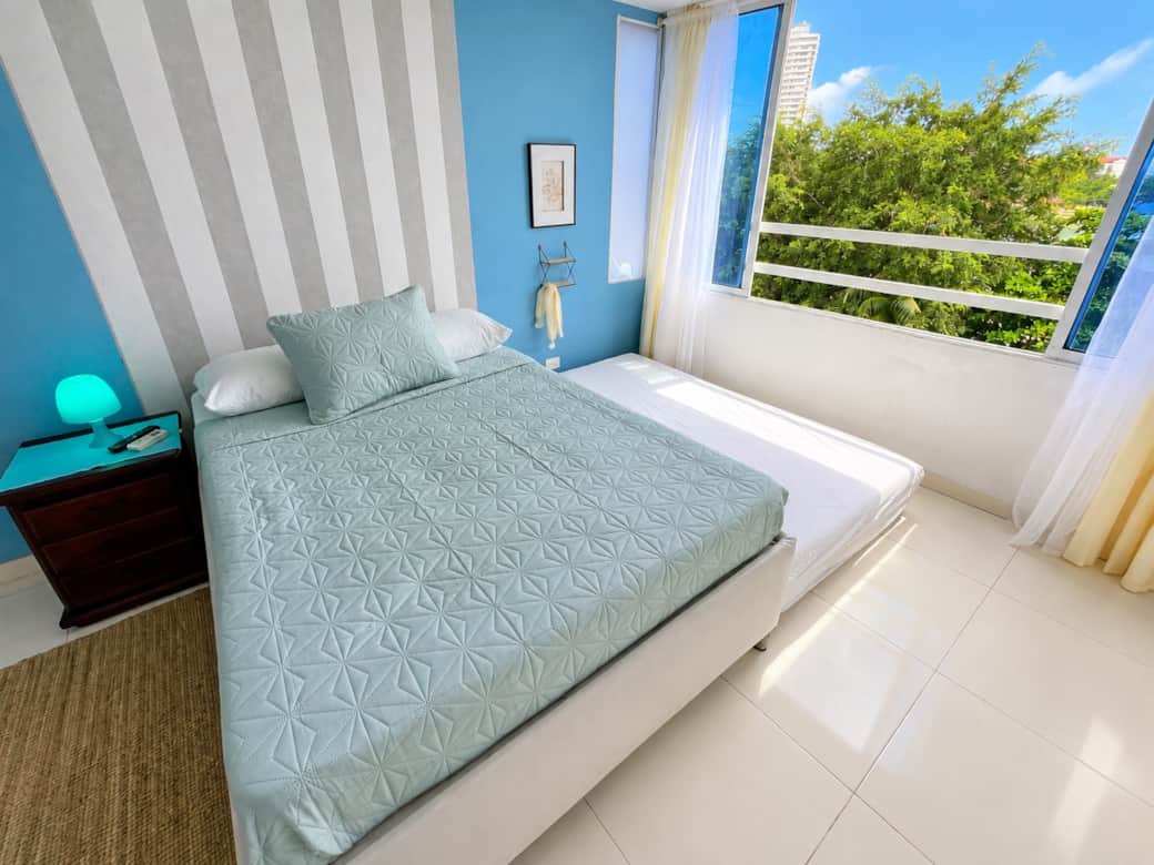 Habitación # 1 con cama doble y cama nido doble