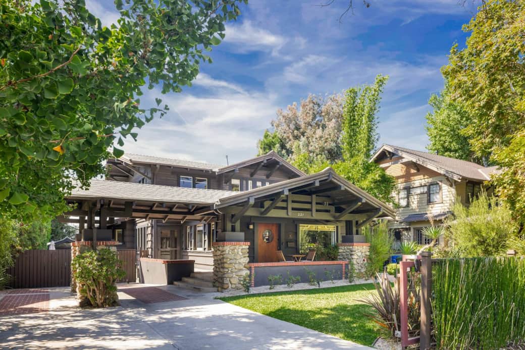 This Craftsman beauty invites you in with its warm woodwork and cozy porch. Absolute dream home!