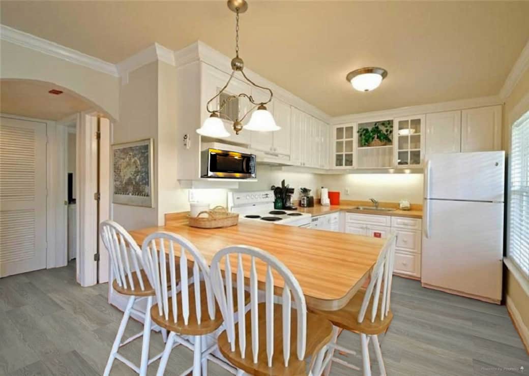 Fully stocked kitchen w/silverware, dishes, glasses, cookware, etc.