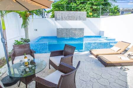 Hang out by the pool and relax in this cozy backyard escape! Hang out by the pool and relax in this cozy backyard escape!