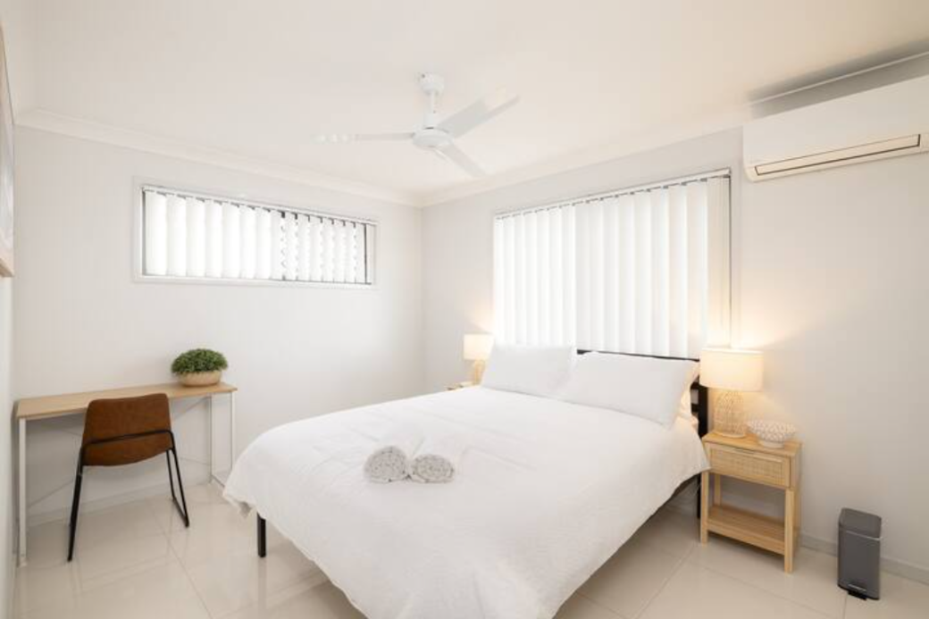 Bedroom: Peaceful bedroom with cozy design and ample storage 