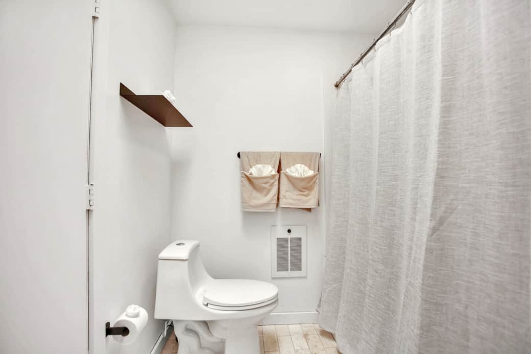 Shared, second bathroom, walk-in shower. 