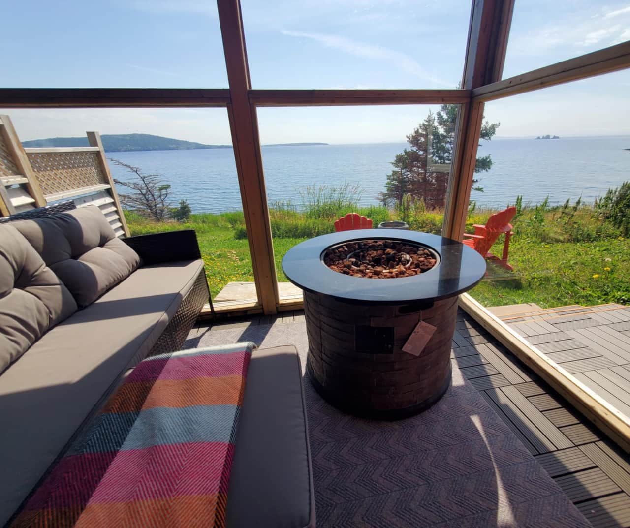 Enclosed sunroom with propane fire table