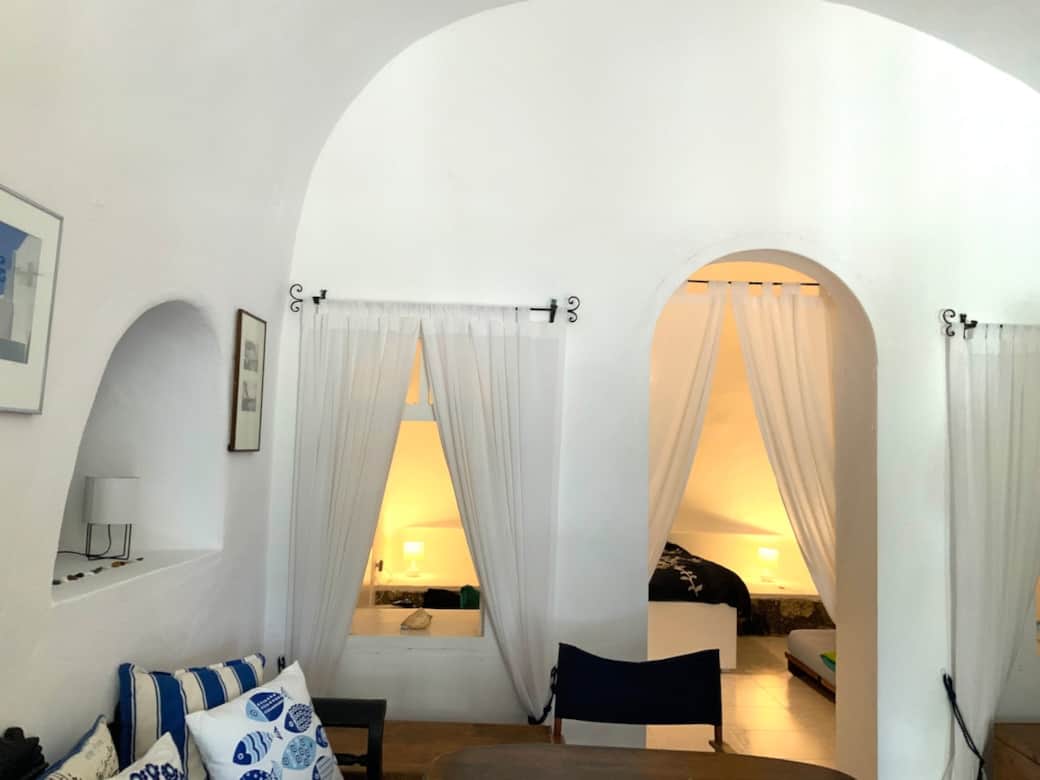 View from living room into master bedroom - traditional architecture 