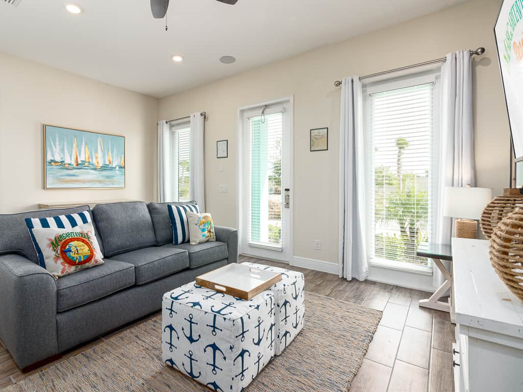 Living room with overhead speakers.