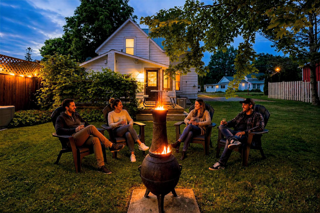 Outdoor dinners under the string lights, with BBQ and patio space to relax together. Outdoor dinners under the string lights, with BBQ and patio space to relax together.