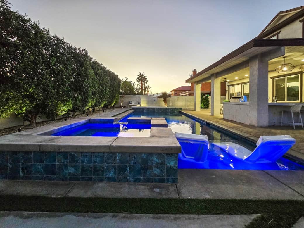 The large hot tub has turbo powered jets for an ultimate massage experience and a prime view of the outdoor 75" 4K Smart TV!