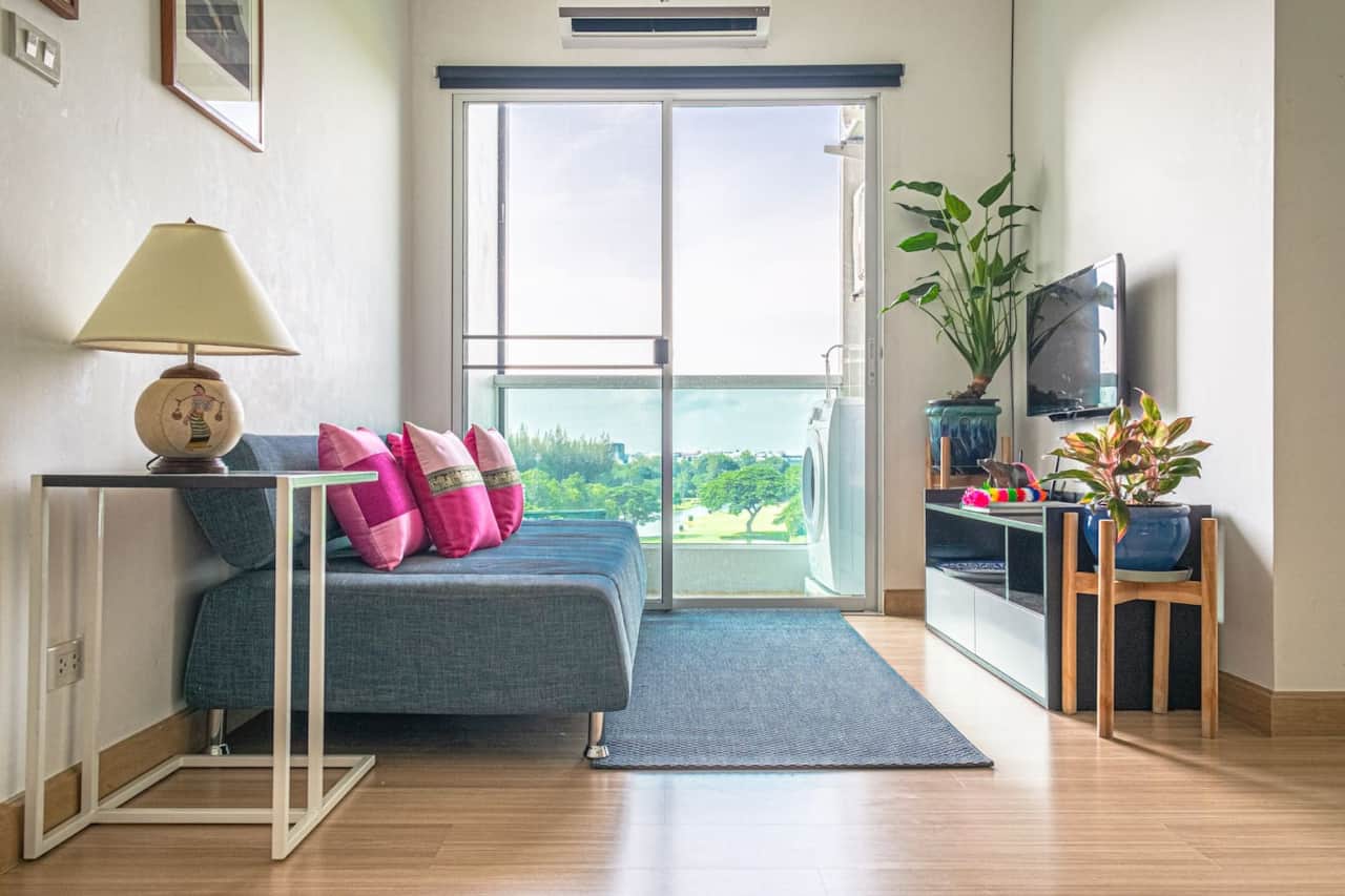 Living room with relaxing view of golf course. No other buildings in front means more privacy.